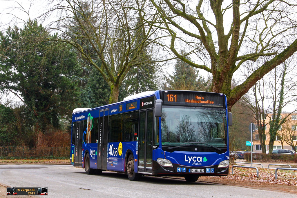 Ein Bild, das Text, Baum, drau�en, Bus enth�lt.

Automatisch generierte Beschreibung