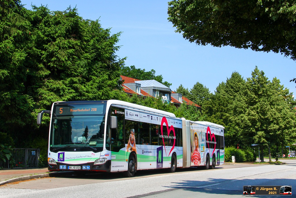 Ein Bild, das Text, Baum, drau�en, Stra�e enth�lt.

Automatisch generierte Beschreibung